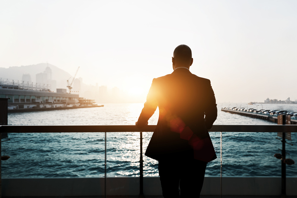 Back,View,Of,Male,Successful,Entrepreneur,Enjoying,Evening,Sunset,While