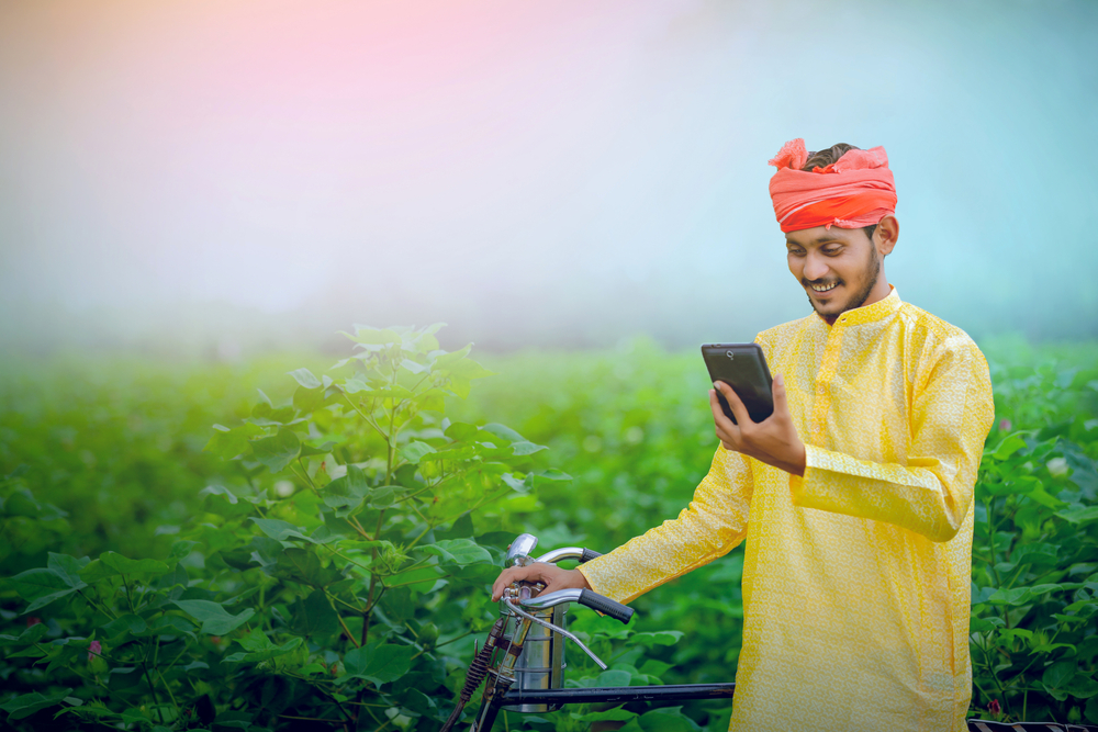 Indian,Farmer,With,Smartphone,,Rural,India