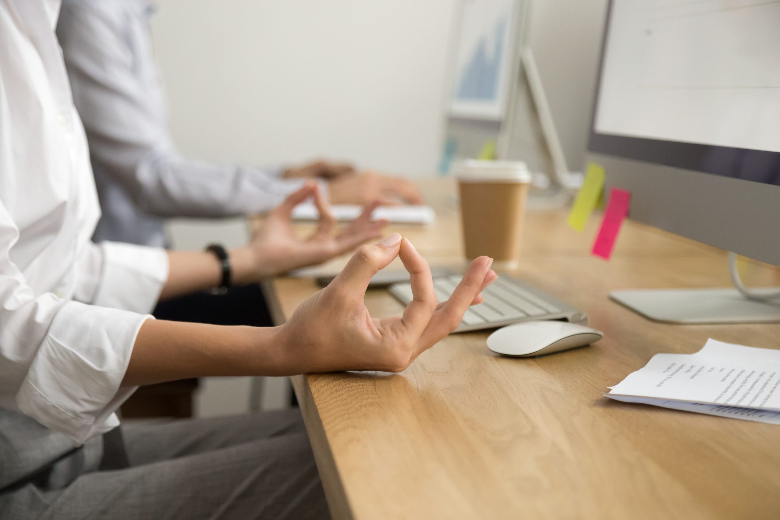 Office yoga for relaxation concept, female hands in mudra, closeup
