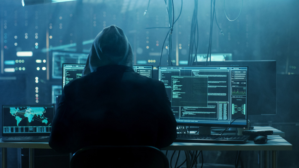 Dangerous,Hooded,Hacker,Breaks,Into,Government,Data,Servers,And,Infects