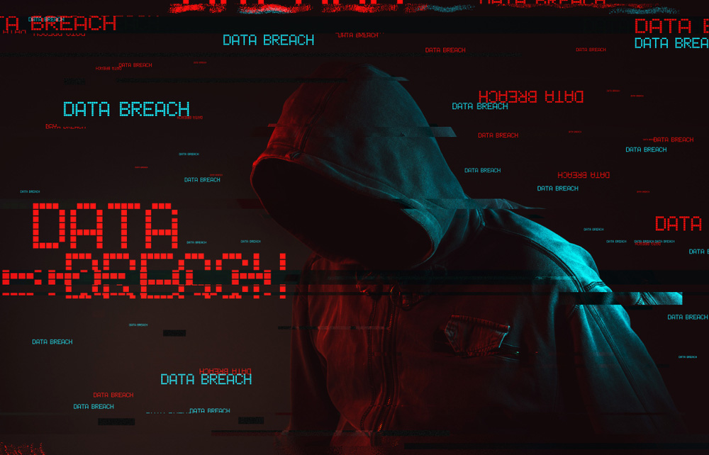 Data,Breach,Concept,With,Faceless,Hooded,Male,Person,,Low,Key